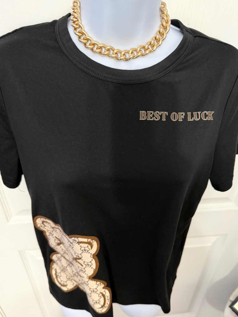 Women's Black 'Best of Luck' Graphic Tee with Decorative Patch